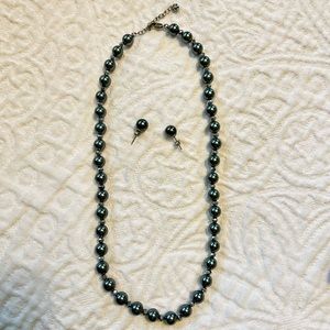 Black pearl necklace and matching earrings